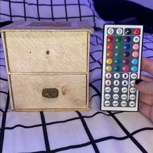 small tan box with flower on top